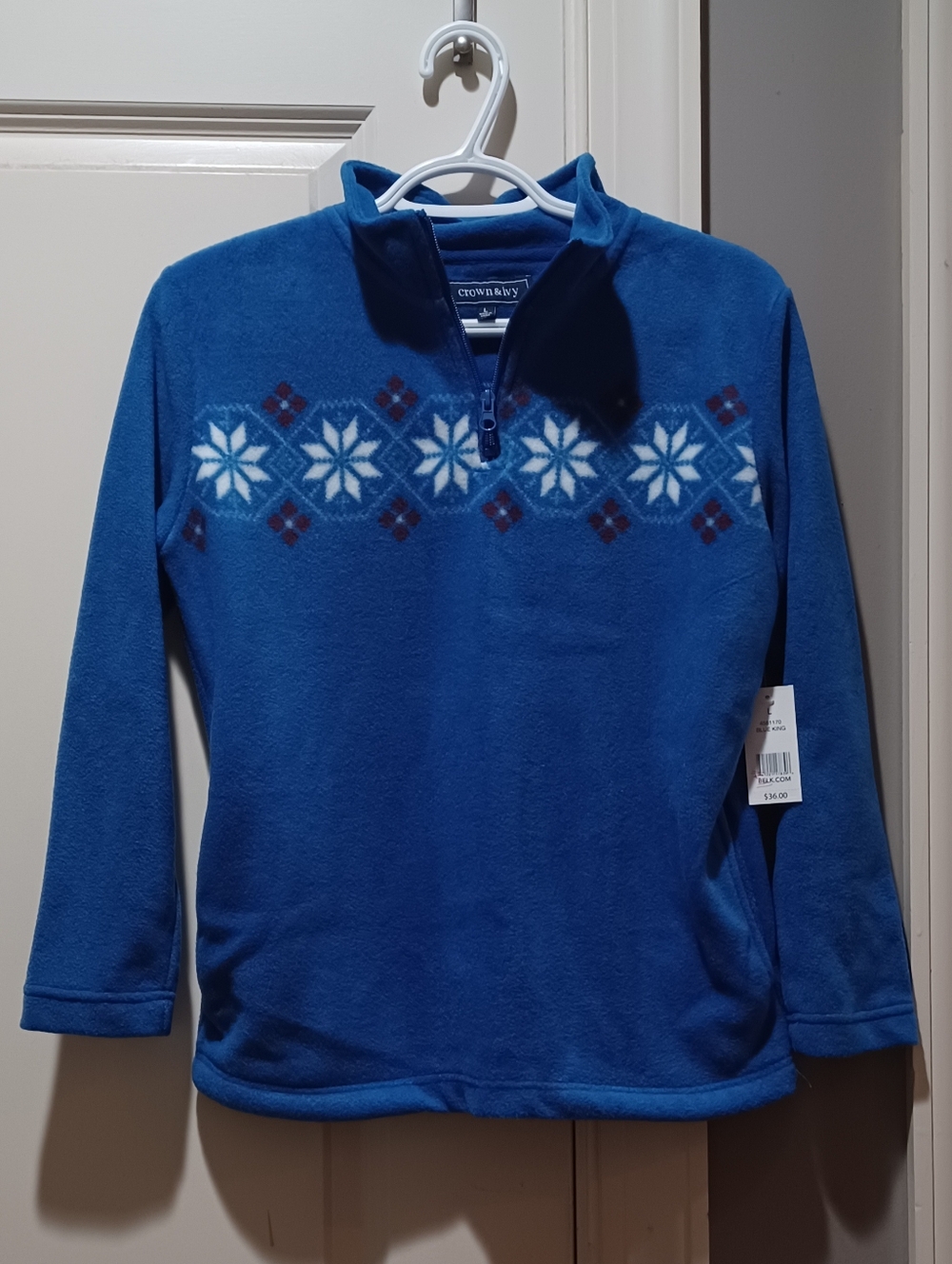 Crown&Ivy Blue Fleece Quarter-Zip Pullover with Snowflake Pattern.